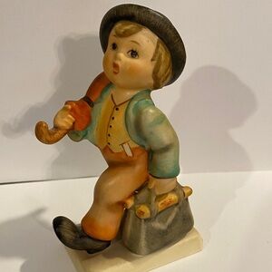 Merry Wanderer Goebel Figurine with Vibrant Orange and Green Details
